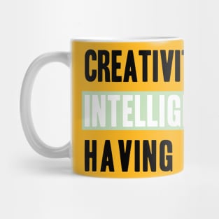 Phrase Creativity is intelligence having fun Mug